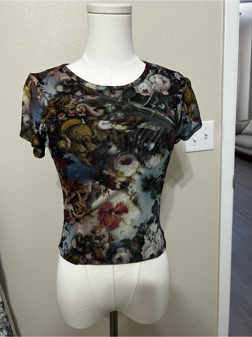 Madden Girl Floral Scenic Sheer Short Sleeve Tee in Black Multi